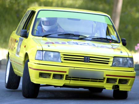 A front engine, front wheel drive car cornering hard